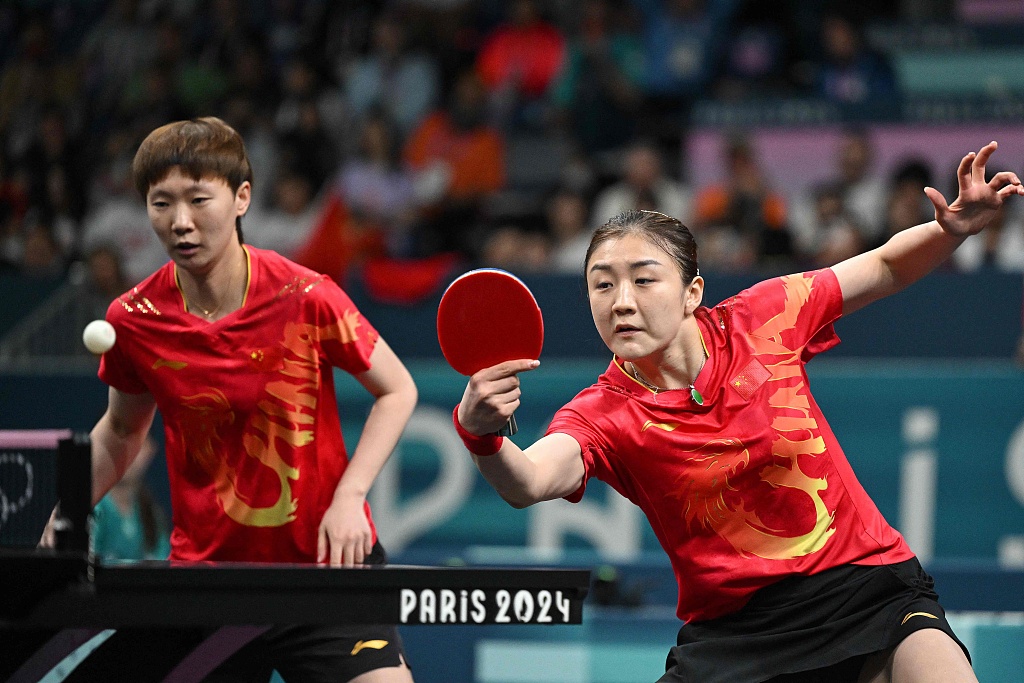 乒乓球世界冠军夫妇合作默契精准夺魁的简单介绍